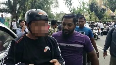 Rakesh (baju ungu), preman yang ancam bunuh jurnalis di Kota Medan