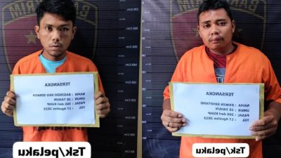 Dua tersangka polisi gadungan yang ditangkap petugas Polres Tapanuli Utara, Kamis (24/8/2023). Keduanya adalah Bagindo Sinaga (29) dan Erwin Sihotang.