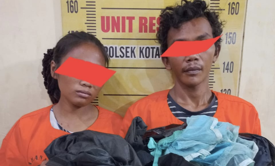 Pasangan suami istri yang nekat bobol rumah warga setelah ditangkap petugas Polsek Kota Kisaran.