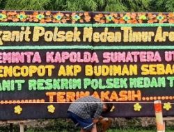 Wow ! Papan Bunga “Copot Kanit Reskrim Polsek Medan Timur” Terpampang depan Polrestabes Medan