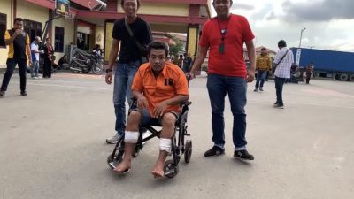 Rahmad Banurea, tersangka pembunuhan yang hendak buang mayat korban pakai becak cacat setelah ditembak petugas Polres Pelabuhan Belawan.