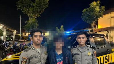 EH, parbetor yang diduga hendak menculik dan melecehkan penumpangnya setelah diamankan petugas Samapta Polrestabes Medan.