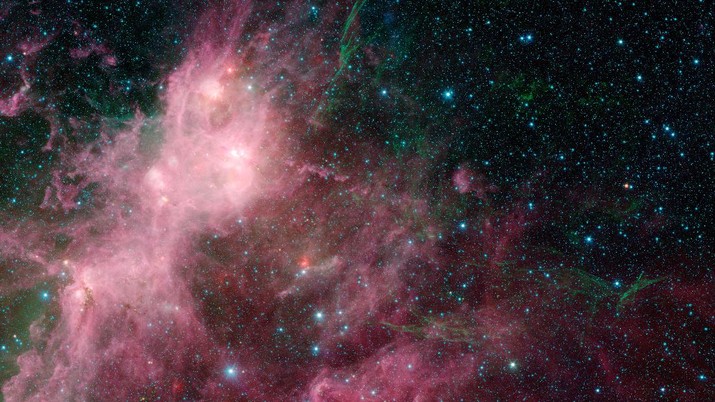 Data inframerah dari Spitzer Space Telescope dan Wide-field Infrared Survey Explorer (WISE) di daerah yang dikenal sebagai daerah pembentuk bintang W3 dan W5 di dalam Galaksi Bima Sakti. (NASA/JPL-Caltech/University of Wisconsin via AP)