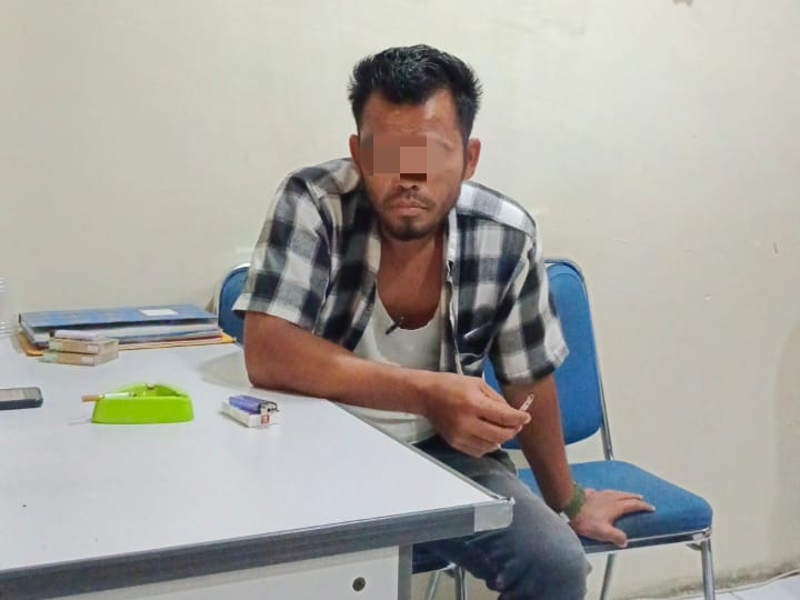 Haris (32) preman kampung pelaku pungli yang ditangkap petugas Polres Pelabuhan Belawan karena meresahkan.