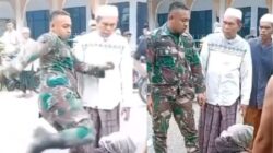 Sebuah video yang memperlihatkan oknum anggota TNI menendang kepala warga viral di media sosial.