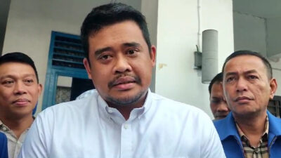 Wali Kota Medan, Bobby Nasution saat memberikan keterangan terkait adanya petugas e-Parking main judi slot, Rabu (12/6/2024).
