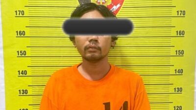 IG alias Poso, petani yang kini ditahan usai membunuh temannya bernaama Ramli Ginting setelah ditangkap petugas Polsek Juhar.