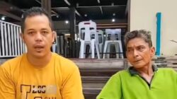 Taufik (baju kuning), driver ojol yang sempat membuat laporan palsu seolah-olah dirinya menjadi korban pembegalan.