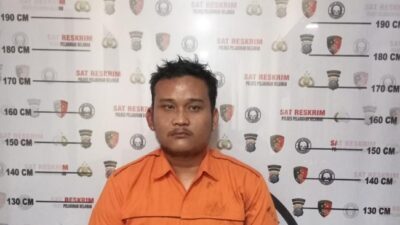 M Reza Fahlefi, sopir taksi online InDriver yang berusaha rudapaksa penumpangnya setelah ditangkap polisi.